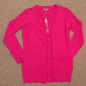 Women's bright pink cardigan sweater